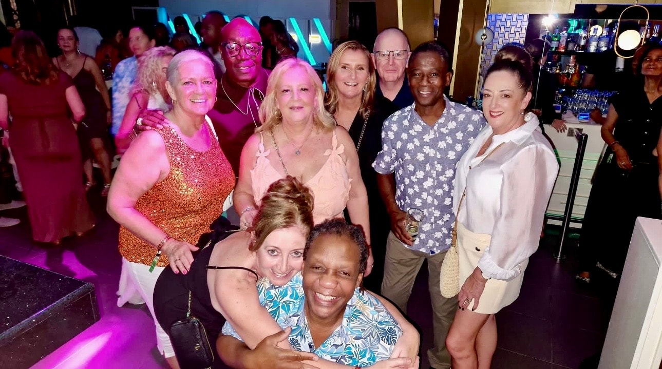 Group of five friends smiling together at Sun & Soul Cyprus 2026